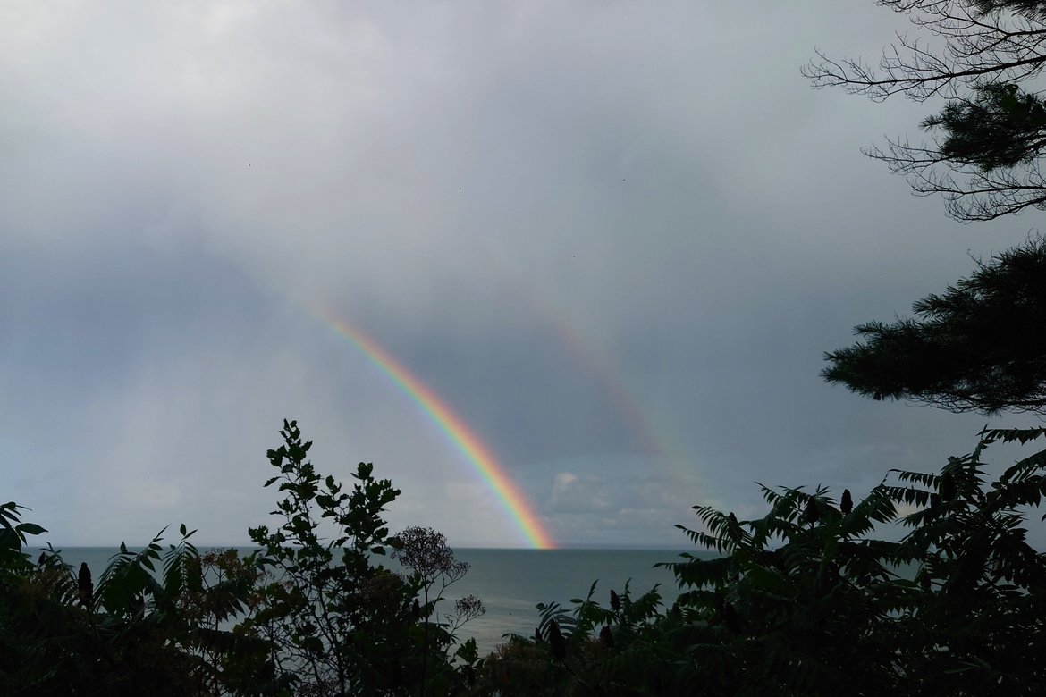 Rainbow over lake superior photographed by Scott Gilbertson