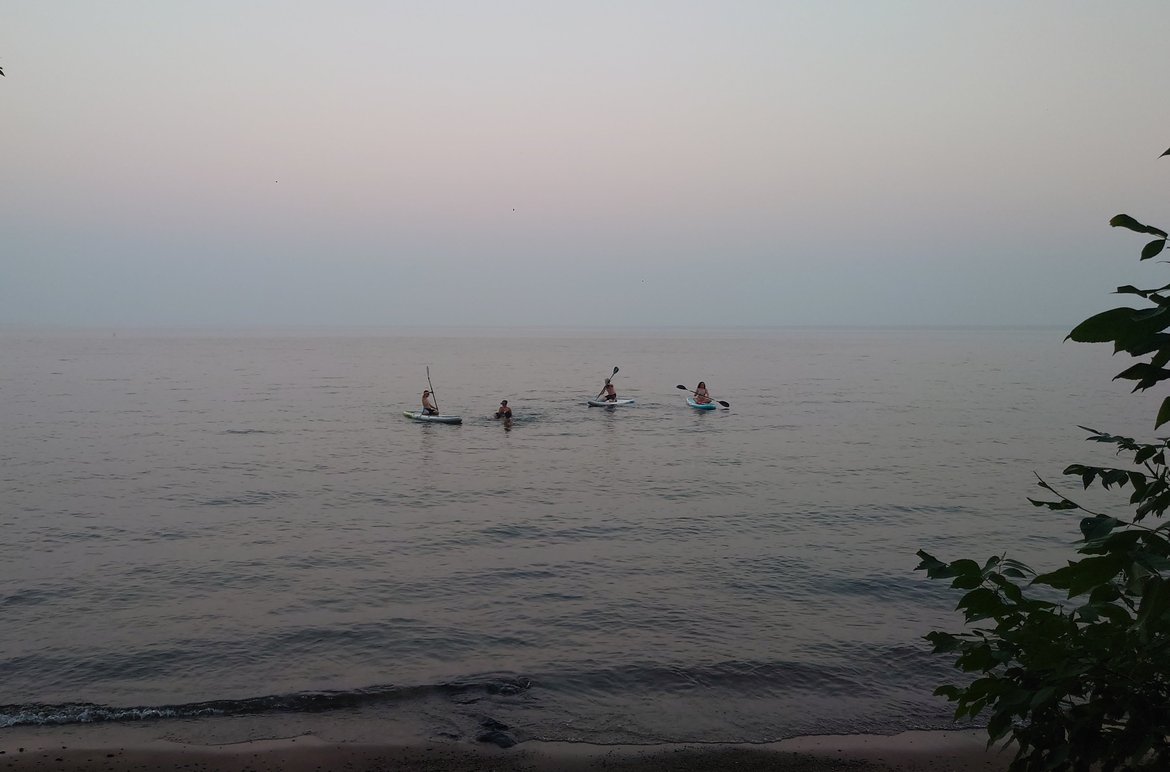 paddleboarding at sunset, washburn, wi photographed by Scott Gilbertson