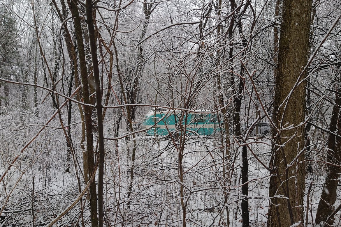 the bus through snowy trees photographed by Scott Gilbertson