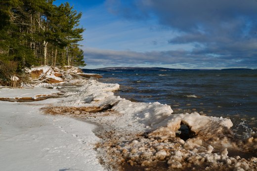 waves of ice on the shore of superior photographed by Scott Gilbertson