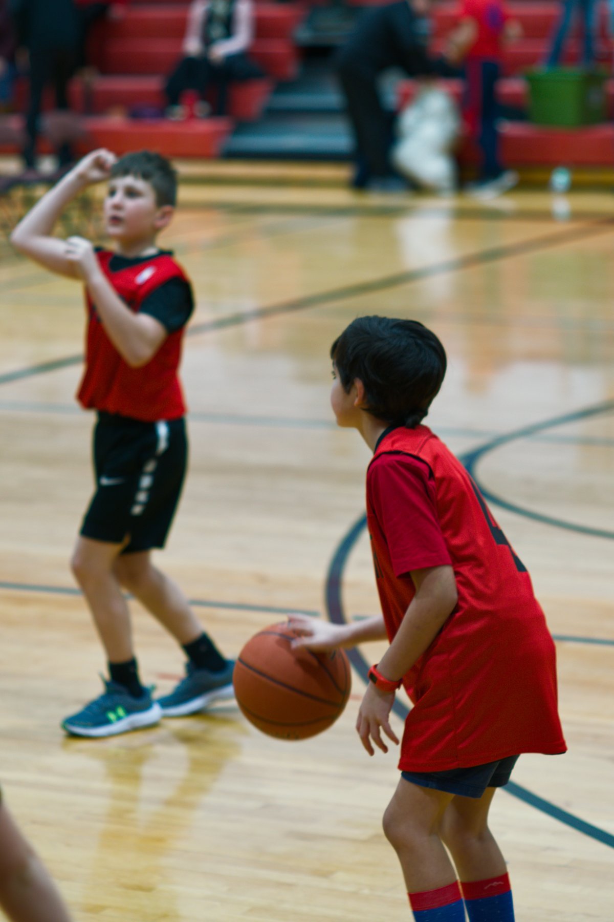 boy dribbling basketball by Scott Gilbertson