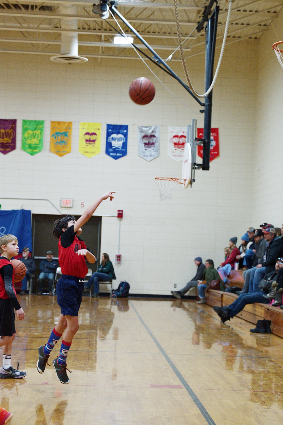 boy shooting a basket by Scott Gilbertson